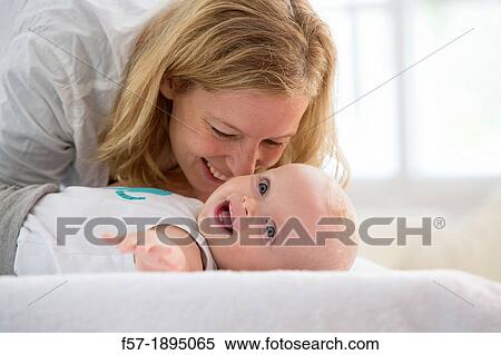Mother with her baby son View Large Photo Image Stock Photography - Mother with her baby son. Fotosearch
