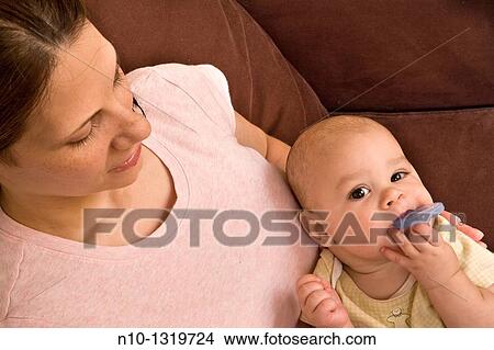 Mother with her six-month old son View Large Photo Image Picture - Mother with her six-month old son. Fotosearch