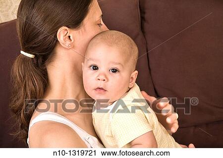 Mother with her six-month old son View Large Photo Image Stock Image - Mother with her six-month old son. Fotosearch
