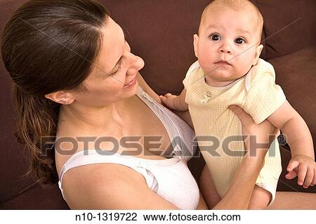 Mother with her six-month old son View Large Photo Image Stock Image - Mother with her six-month old son. Fotosearch