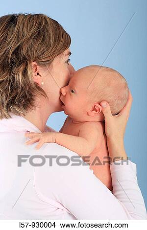 mother with new born baby child, Studio shot View Large Photo Image Picture - mother with new born baby child, Studio shot. Fotosearch