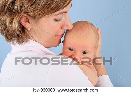 mother with new born baby child, Studio shot View Large Photo Image Stock Image - mother with new born baby child, Studio shot. Fotosearch