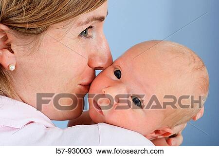 mother with new born baby child, Studio shot View Large Photo Image Stock Image - mother with new born baby child, Studio shot. Fotosearch