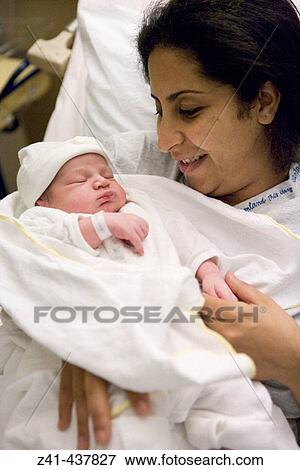 Mother with newborn baby View Large Photo Image Stock Photo - Mother with newborn baby. Fotosearch
