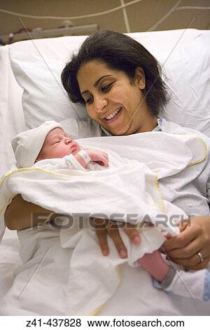 Mother with newborn baby View Large Photo Image Stock Photo - Mother with newborn baby. Fotosearch