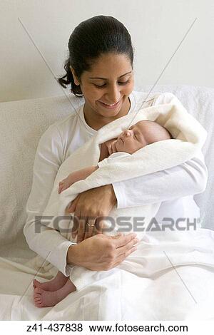 Mother with newborn baby View Large Photo Image Stock Photo - Mother with newborn baby. Fotosearch