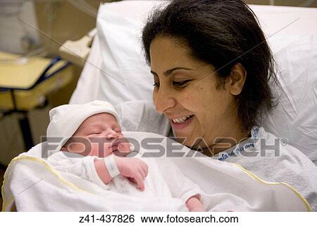 Mother with newborn baby View Large Photo Image Stock Photograph - Mother with newborn baby. Fotosearch