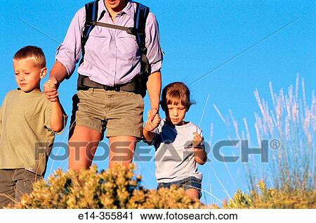 Mother with son and daughter hiking. Dixie Natural Forest. Utah. USA. View Large Photo Image Stock Image - Mother with son and daughter hiking. Dixie Natural Forest. Utah. USA.. Fotosearch