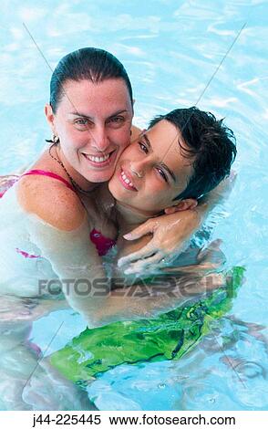 Mother with son in the pool View Large Photo Image Stock Photography - Mother with son in the pool. Fotosearch