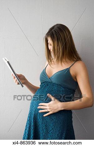 Motherhood, paternity, parental, mother, mom, first time mom, expecting View Large Photo Image Stock Photograph - Motherhood, paternity, parental, mother, mom, first time mom, expecting. Fotosearch