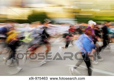 Motion blur of runners at the start of the 2009 Chicago Marathon View Large Photo Image Stock Image - Motion blur of runners at the start of the 2009 Chicago Marathon. Fotosearch