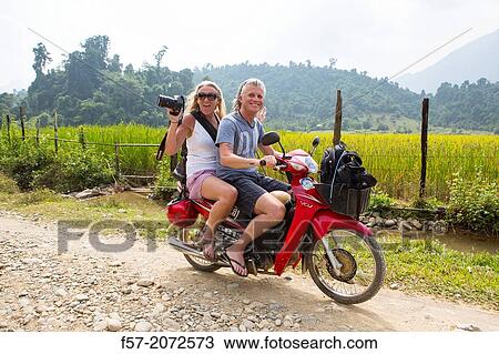 Motorbike rental in Vang Vieng, Laos. View Large Photo Image Stock Image - Motorbike rental in Vang Vieng, Laos.. Fotosearch
