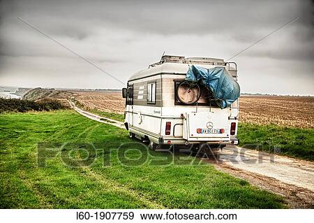 Stock Photo - Motorhome in Longues sur Mer, Normandy, France. Fotosearch
