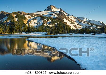 Mount Jefferson seen from ice covered Russell Lake in Jefferson Park, Mount Jefferson Wilderness, Oregon View Large Photo Image Stock Photography - Mount Jefferson seen from ice covered Russell Lake in Jefferson Park, Mount Jefferson Wilderness, Oregon. Fotosearch