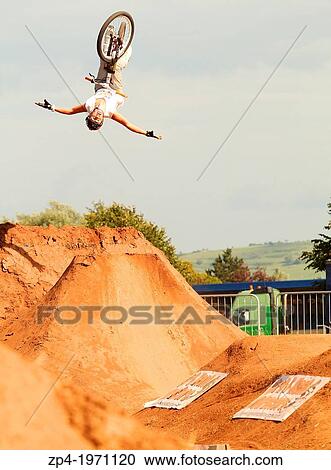 Mountain Biker Charlie Watts doing a Backflip No Hander over a jump at NASS festival. View Large Photo Image Stock Image - Mountain Biker Charlie Watts doing a Backflip No Hander over a jump at NASS festival.. Fotosearch