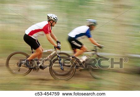 Mountain biker riding fast in forest at Deer Valley. Utah, USA View Large Photo Image Stock Photo - Mountain biker riding fast in forest at Deer Valley. Utah, USA. Fotosearch