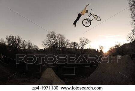 Mountain Biker Sam Reynolds doing a superman no hander in California. View Large Photo Image Stock Image - Mountain Biker Sam Reynolds doing a superman no hander in California.. Fotosearch