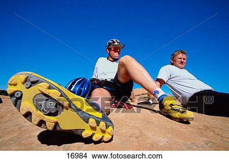 Mountain bikers at rest View Large Photo Image Picture - Mountain bikers at rest. Fotosearch