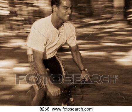 Stock Photograph - Mountain biking. Fotosearch
