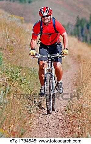 mountain biking the Cold Springs Trail on Bald Mountain at Sun Valley Resort near the cities of Ketchum and Sun Valley in central Idaho View Large Photo Image Stock Photography - mountain biking the Cold Springs Trail on Bald Mountain at Sun Valley Resort near the cities of Ketchum and Sun Valley in central Idaho. Fotosearch