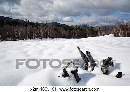 Mountain range from a sandpit along the Kancamagus Highway during the winter months in the White Mountains, New Hampshire USA This area was part of the Swift River Railroad, which was an logging railroad in operation from 1906 - 1916 View Large Photo Image Stock Image - Mountain range from a sandpit along the Kancamagus Highway during the winter months in the White Mountains, New Hampshire USA This area was part of the Swift River Railroad, which was an logging railroad in operation from 1906 - 1916. Fotosearch