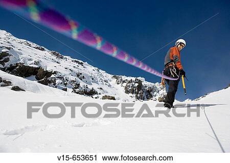 Mountaineer in snow on Mountain View Large Photo Image Stock Image - Mountaineer in snow on Mountain. Fotosearch