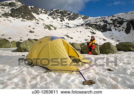 Mountaineer next to the yellow tent in the Sierra de B? jar Natural Park, in Salamanca province, Biosphere Reserve of Sierra de B? jar and Francia View Large Photo Image Stock Image - Mountaineer next to the yellow tent in the Sierra de B? jar Natural Park, in Salamanca province, Biosphere Reserve of Sierra de B? jar and Francia. Fotosearch