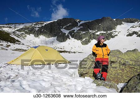 Mountaineer next to the yellow tent in the Sierra de B? jar Natural Park, in Salamanca province, Biosphere Reserve of Sierra de B? jar and Francia View Large Photo Image Stock Photo - Mountaineer next to the yellow tent in the Sierra de B? jar Natural Park, in Salamanca province, Biosphere Reserve of Sierra de B? jar and Francia. Fotosearch
