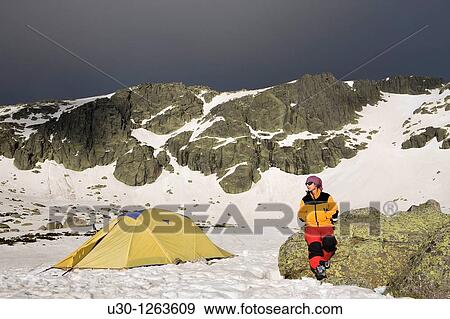 Mountaineer next to the yellow tent in the Sierra de B? jar Natural Park, in Salamanca province, Biosphere Reserve of Sierra de B? jar and Francia View Large Photo Image Stock Photo - Mountaineer next to the yellow tent in the Sierra de B? jar Natural Park, in Salamanca province, Biosphere Reserve of Sierra de B? jar and Francia. Fotosearch