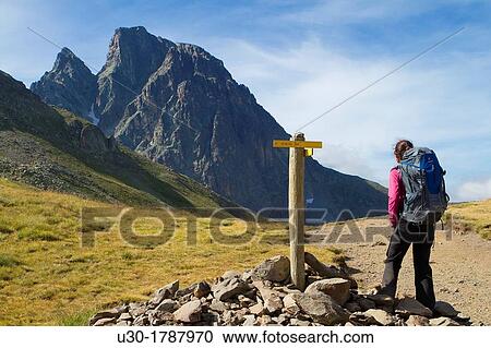 Mountaineer walking near Midi D? Ossau peak, in National Park des Pyrenees, in Bearn province Atlantics Pyrenees Aquitania, France Europe View Large Photo Image Stock Image - Mountaineer walking near Midi D? Ossau peak, in National Park des Pyrenees, in Bearn province Atlantics Pyrenees Aquitania, France Europe. Fotosearch