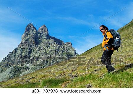 Mountaineer walking near Midi D? Ossau peak, in National Park des Pyrenees, in Bearn province Atlantics Pyrenees Aquitania, France Europe View Large Photo Image Stock Photo - Mountaineer walking near Midi D? Ossau peak, in National Park des Pyrenees, in Bearn province Atlantics Pyrenees Aquitania, France Europe. Fotosearch