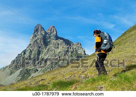 Mountaineer walking near Midi D? Ossau peak, in National Park des Pyrenees, in Bearn province Atlantics Pyrenees Aquitania, France Europe View Large Photo Image Stock Photo - Mountaineer walking near Midi D? Ossau peak, in National Park des Pyrenees, in Bearn province Atlantics Pyrenees Aquitania, France Europe. Fotosearch
