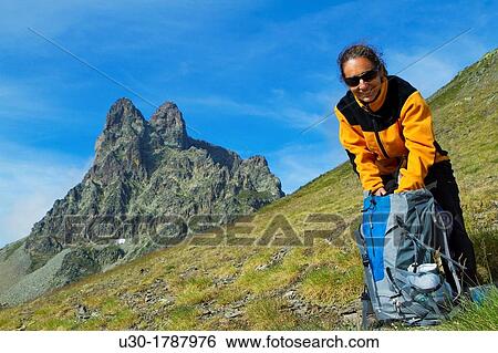 Mountaineer walking near Midi D? Ossau peak, in National Park des Pyrenees, in Bearn province Atlantics Pyrenees Aquitania, France Europe View Large Photo Image Stock Photograph - Mountaineer walking near Midi D? Ossau peak, in National Park des Pyrenees, in Bearn province Atlantics Pyrenees Aquitania, France Europe. Fotosearch