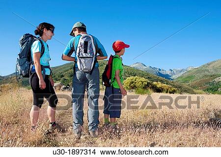 Mountaineers resting in Sierra de Gredos Regional Park,? vila Castilla y Le? n Spain View Large Photo Image Picture - Mountaineers resting in Sierra de Gredos Regional Park,? vila Castilla y Le? n Spain. Fotosearch