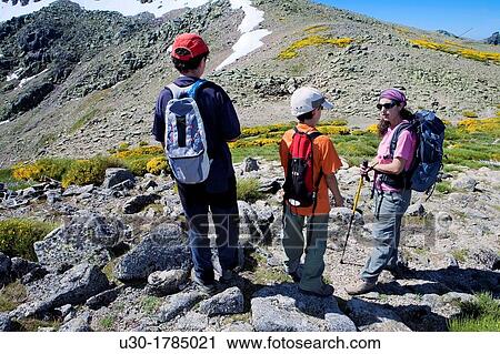 Stock Image - Mountaineers walking between the Biosphere Reserve of Sierra de B? jar and Francia Salamanca and Sierra de Gredos Regional Park? vila Castilla y Le? n Spain. Fotosearch