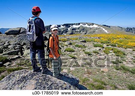 Mountaineers walking between the Biosphere Reserve of Sierra de B? jar and Francia Salamanca and Sierra de Gredos Regional Park? vila Castilla y Le? n Spain View Large Photo Image Stock Photo - Mountaineers walking between the Biosphere Reserve of Sierra de B? jar and Francia Salamanca and Sierra de Gredos Regional Park? vila Castilla y Le? n Spain. Fotosearch