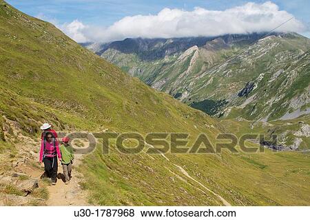 Mountaineers walking in Midi D? Ossau peak, in National Park des Pyrenees, in Bearn province Atlantics Pyrenees Aquitania, France Europe View Large Photo Image Stock Photo - Mountaineers walking in Midi D? Ossau peak, in National Park des Pyrenees, in Bearn province Atlantics Pyrenees Aquitania, France Europe. Fotosearch