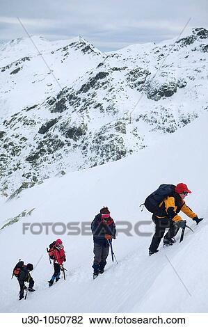 Mountaineers walking in Sierra de Barco Mountains of Sierra de Gredos National Park? vila Castilla y Le? n Spain View Large Photo Image Stock Image - Mountaineers walking in Sierra de Barco Mountains of Sierra de Gredos National Park? vila Castilla y Le? n Spain. Fotosearch