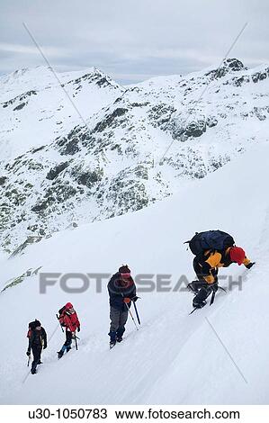 Mountaineers walking in Sierra de Barco Mountains of Sierra de Gredos National Park? vila Castilla y Le? n Spain View Large Photo Image Stock Image - Mountaineers walking in Sierra de Barco Mountains of Sierra de Gredos National Park? vila Castilla y Le? n Spain. Fotosearch