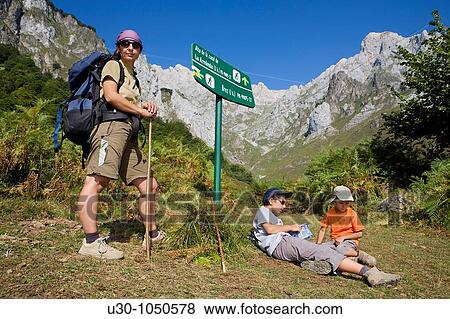 Mountaineers walking in the mountains of Andara Massif Brez, in the municipality of Camaleo, in the Li? bana Valley Picos de Europa National Park Cantabria Spain View Large Photo Image Stock Photo - Mountaineers walking in the mountains of Andara Massif Brez, in the municipality of Camaleo, in the Li? bana Valley Picos de Europa National Park Cantabria Spain. Fotosearch