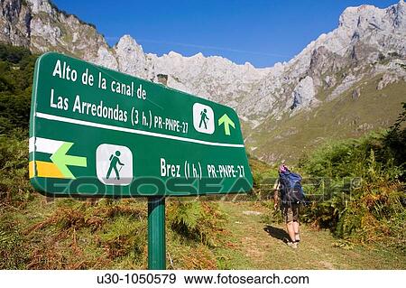 Mountaineers walking in the mountains of Andara Massif Brez, in the municipality of Camaleo, in the Li? bana Valley Picos de Europa National Park Cantabria Spain View Large Photo Image Stock Photo - Mountaineers walking in the mountains of Andara Massif Brez, in the municipality of Camaleo, in the Li? bana Valley Picos de Europa National Park Cantabria Spain. Fotosearch