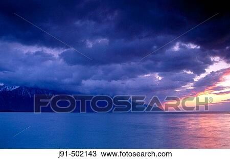 Mountains. Chablais region. Evening on the Geneva Lake. Montreux. Switzerland. View Large Photo Image Stock Image - Mountains. Chablais region. Evening on the Geneva Lake. Montreux. Switzerland.. Fotosearch