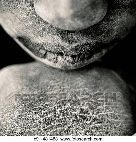 Mouth and knee of an African child. Tanzania View Large Photo Image Stock Photo - Mouth and knee of an African child. Tanzania. Fotosearch