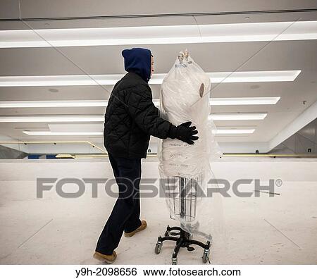Movers from Globe Moving and Storage transfer mannequins slated for Parsons? famed School of Fashion into the new University Center building of the New School for Social Research in Greenwich Village in New York. View Large Photo Image Stock Photograph - Movers from Globe Moving and Storage transfer mannequins slated for Parsons? famed School of Fashion into the new University Center building of the New School for Social Research in Greenwich Village in New York.. Fotosearch