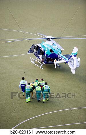 Moving of a patient in helicopter, emergency. Hospital de Zumarraga, Gipuzkoa, Euskadi. Spain. View Large Photo Image Stock Image - Moving of a patient in helicopter, emergency. Hospital de Zumarraga, Gipuzkoa, Euskadi. Spain.. Fotosearch
