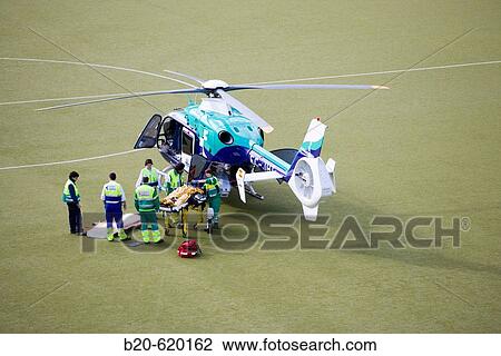 Stock Image - Moving of a patient in helicopter, emergency. Hospital de Zumarraga, Gipuzkoa, Euskadi. Spain.. Fotosearch