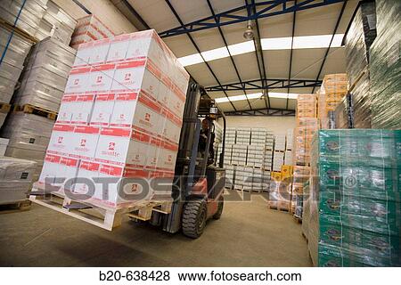 Moving pallets, office supplies at store house. Guipuzcoa, Euskadi, Spain View Large Photo Image Stock Photo - Moving pallets, office supplies at store house. Guipuzcoa, Euskadi, Spain. Fotosearch