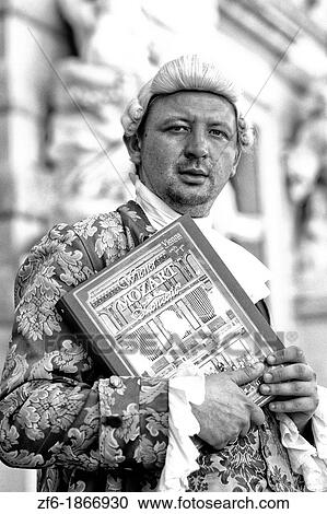 Mozart costumed man at Hofburg Imperial Palace in old town of Vienna Austria View Large Photo Image Stock Image - Mozart costumed man at Hofburg Imperial Palace in old town of Vienna Austria. Fotosearch