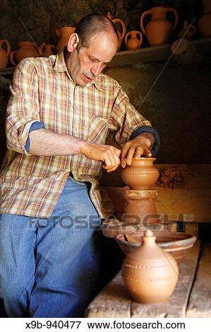 Mr Jo? o da Rita making traditional azorean pottery? loi? a da Vila? in Vila Franca do Campo Sao Miguel island, Azores, Portugal View Large Photo Image Stock Photo - Mr Jo? o da Rita making traditional azorean pottery? loi? a da Vila? in Vila Franca do Campo Sao Miguel island, Azores, Portugal. Fotosearch