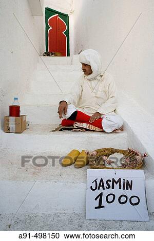 Mr Mohammed, jasmine flowers seller. Village of Sidi Bou Said near Tunis. Tunisia View Large Photo Image Stock Image - Mr Mohammed, jasmine flowers seller. Village of Sidi Bou Said near Tunis. Tunisia. Fotosearch